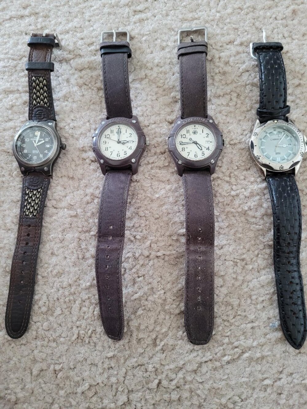 Four men's Timex watches with Indiglo in good condition